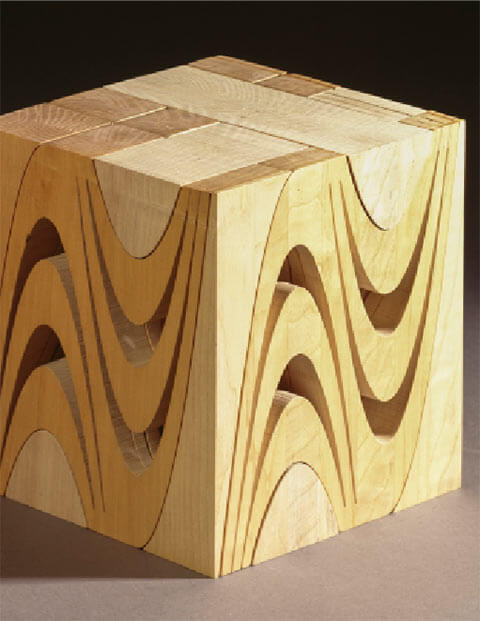 Parabolische Durchdringung, 1991, Eschenholz, 32 x 30 x 30 cm, geschlossener Block mit 15 Teilen